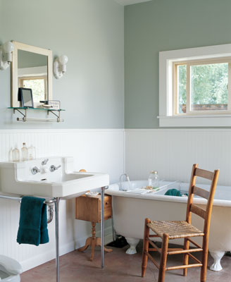Marty Mitchell and Blair Meerfeld have minimized mold and maximized aesthetics with this antique bathtub. Their bathroom is a character-filled collection of salvaged and refurbished furnishings.